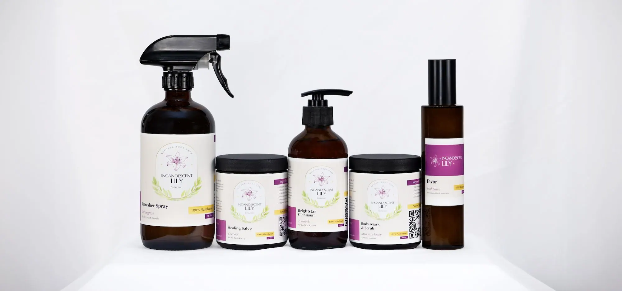 The Incandescent Lily Collection lineup of amber bottles and jars